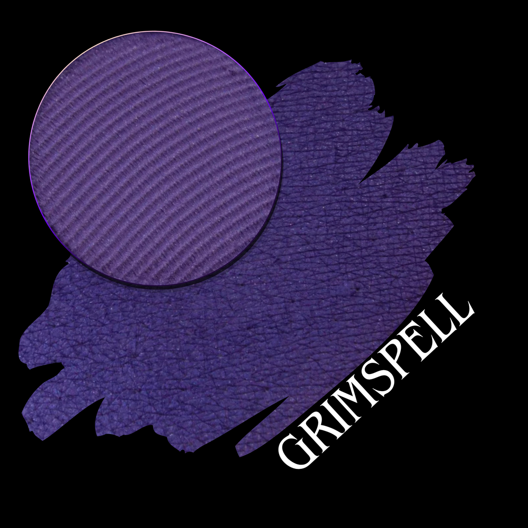 A circular close-up of a textured purple cosmetic product shown over a larger matching purple swatch on a black background, with the text 'GRIMSPELL' in white along the lower right.
