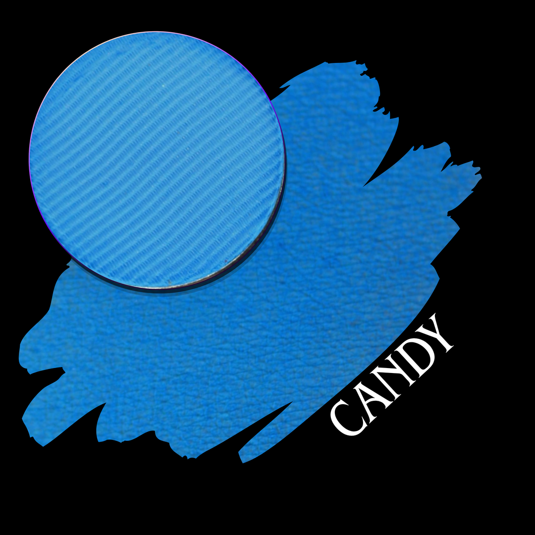 A blue textured circular eyeshadow makeup pan with a matching swatch of pigment on a black background, with the word 'CANDY' in white script along the lower right edge.