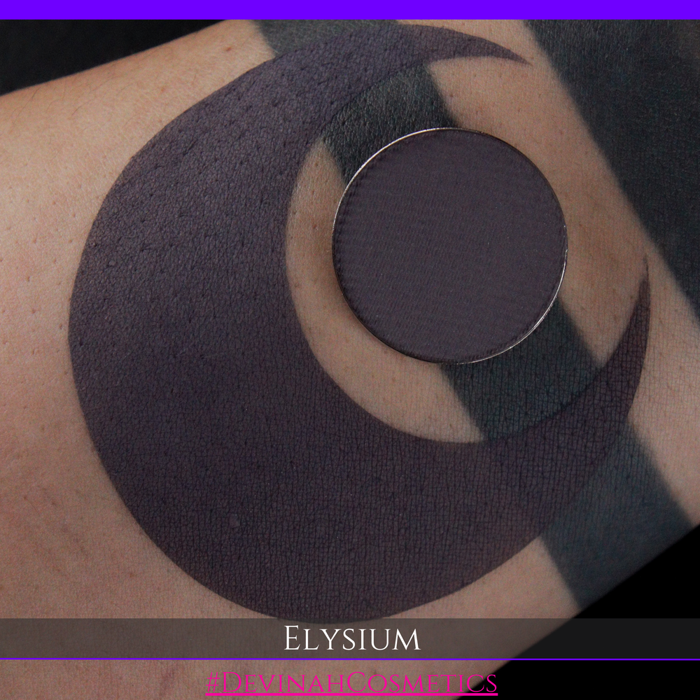 Close-up of a tattoo on skin with 'Elysium' branding.