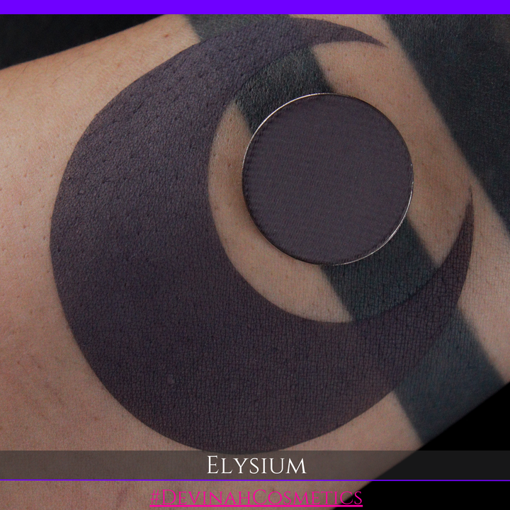 Close-up of a tattoo on skin with 'Elysium' branding.