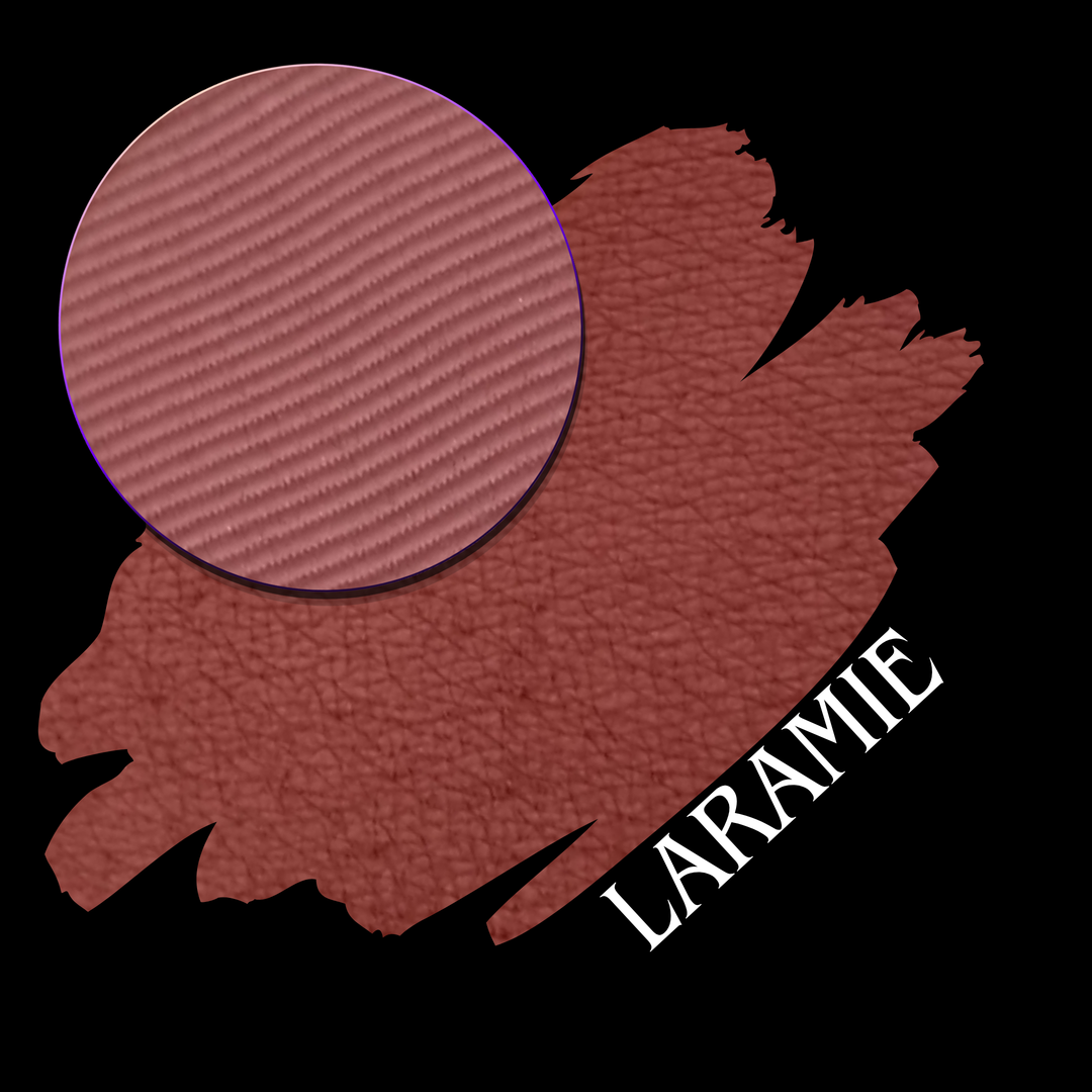 A swatch in a dusty rose-brown color, featuring a circular eyeshadow makeup pan and the name 'LARAMIE' in white text on a black background.