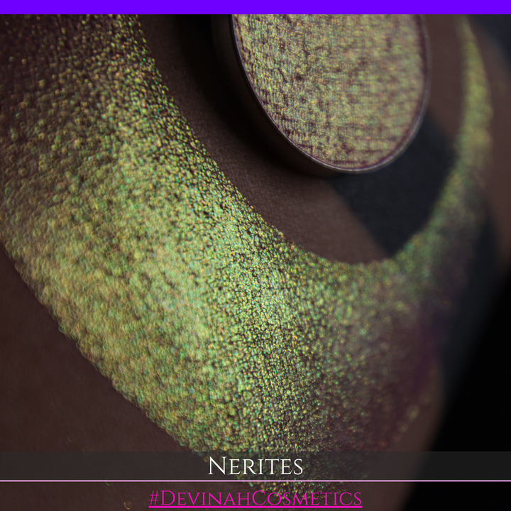 A round eyeshadow pan labeled 'NERITES' made by Devinah Cosmetics, placed over a large crescent moon swatch of the same shimmering multichrome eyeshadow on skin. The eyeshadow has a shimmer sparkle finish shifting between colors pink, yellow, gold, green.