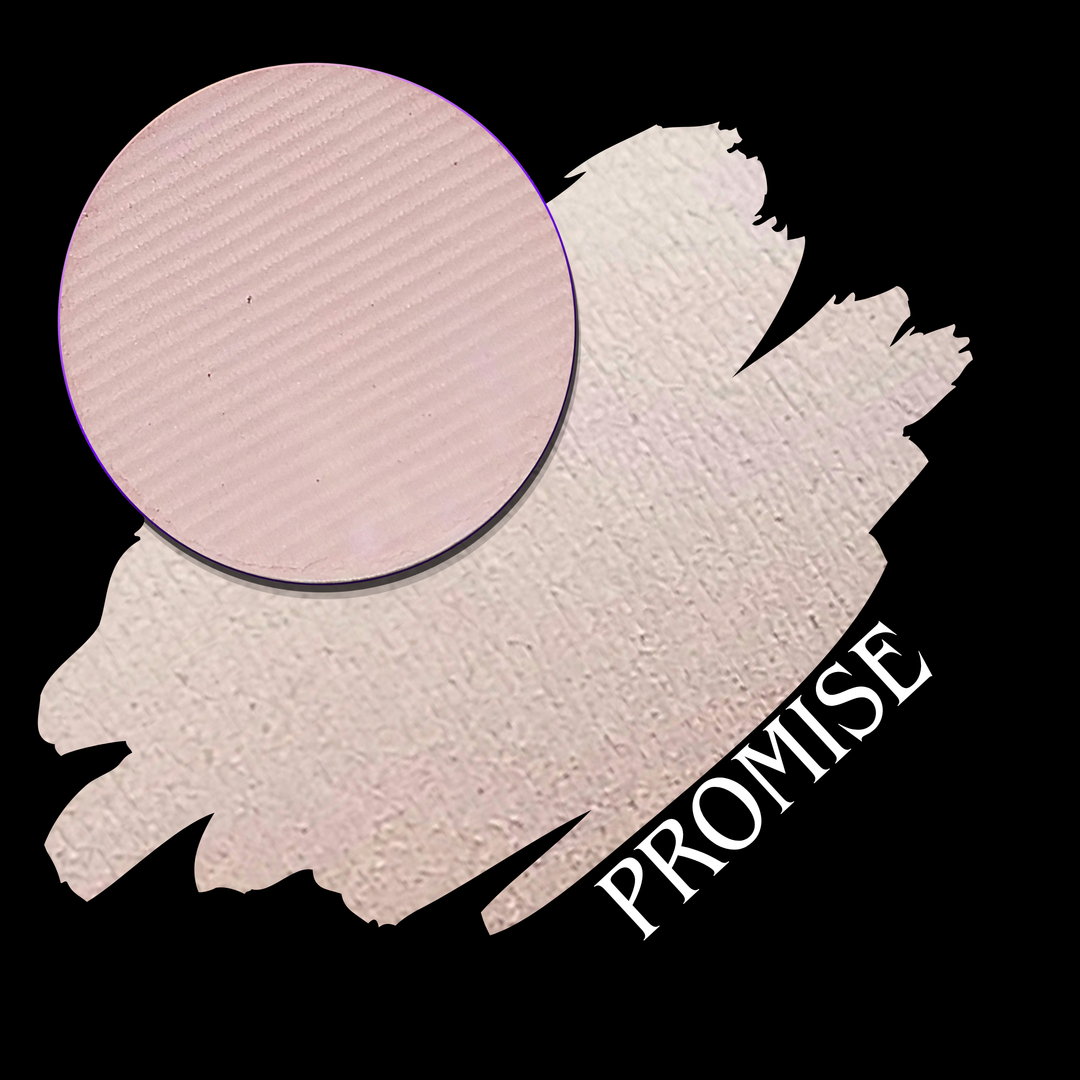 A makeup swatch showing a light pink makeup swatch with a circular close-up of a pressed eyeshadow powder pan, labeled 'PROMISE' on a black background.