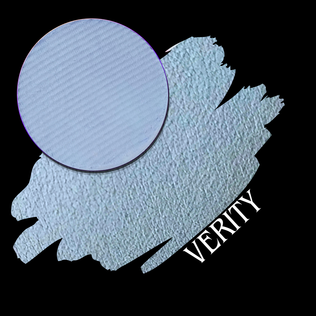 A textured light blue swatch with a pressed powder eyeshadow pan of matte pigment on a black background, with the word 'VERITY' in white text.