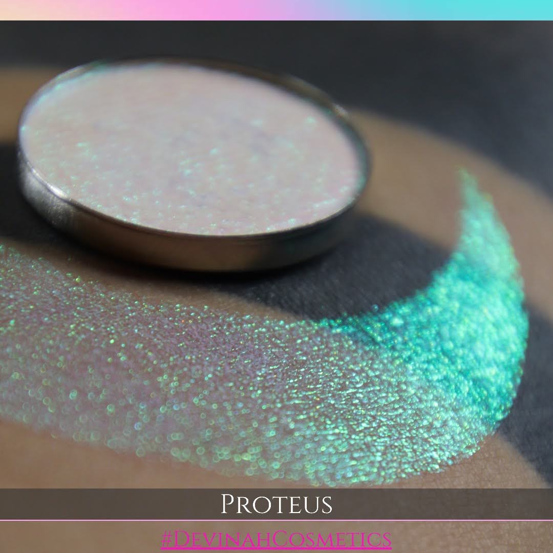 Proteus eyeshadow with gold, yellow, green, blue and pink in this iridescent multichrome