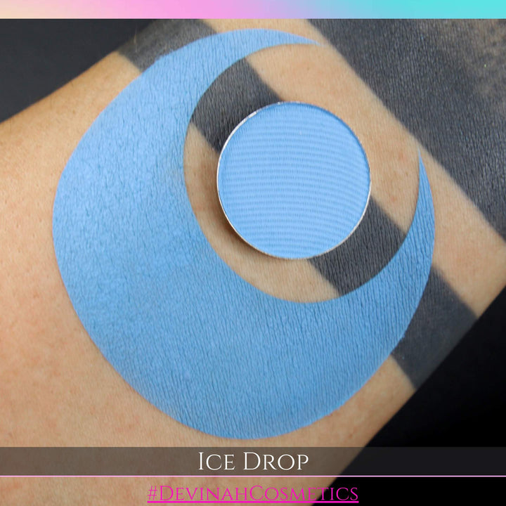 Blue circular swatch on skin with 'Ice Drop' text and 'Devinah Cosmetics' branding.