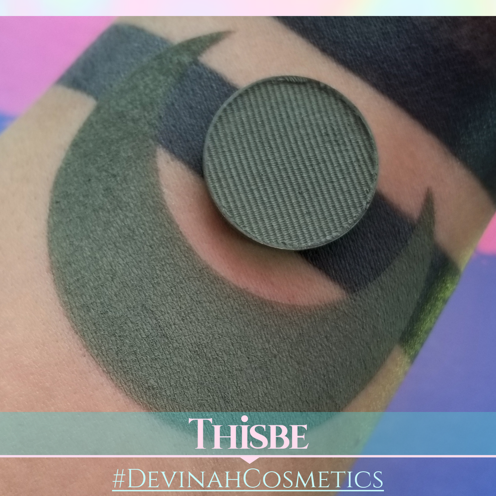 Green eyeshadow pan with swatch, featuring 'Thisbe' and '#DevinahCosmetics'.